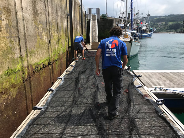 Preparation of farming nets for installation at sea